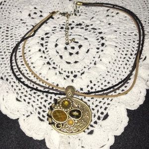 Corded Necklace goldtone faceted stones medallion